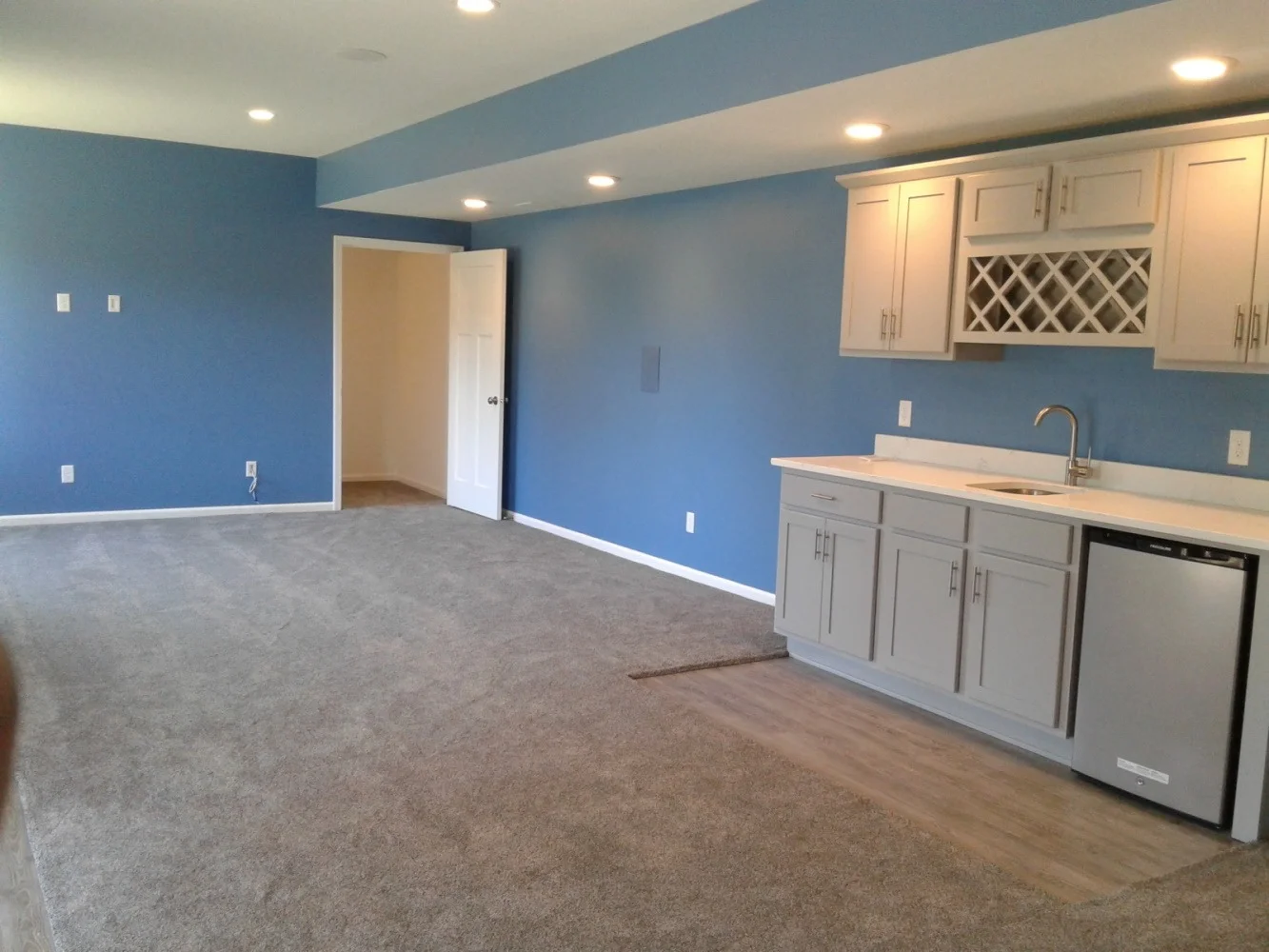 How a Finished Basement Contractor in Waukee Enhances Living Space?